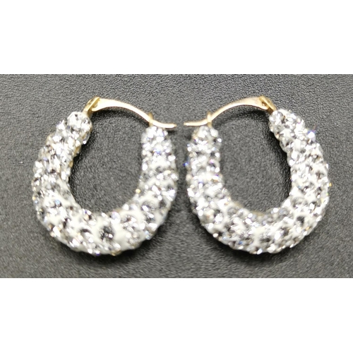 692 - PRESENTED AS A PAIR OF 9ct GOLD EARRINGS