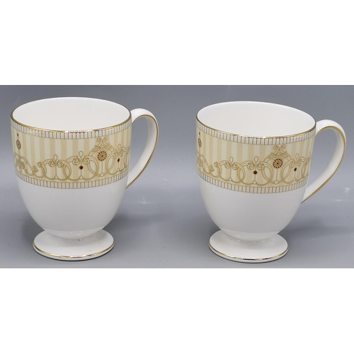 731 - WEDGWOOD CHINA FOOTED MUGS (2)