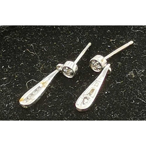 1016 - PRESENTED AS A PAIR OF 9ct WHITE GOLD / CUBIC ZIRCONIA EARRINGS (Weight 1.1 Grams)