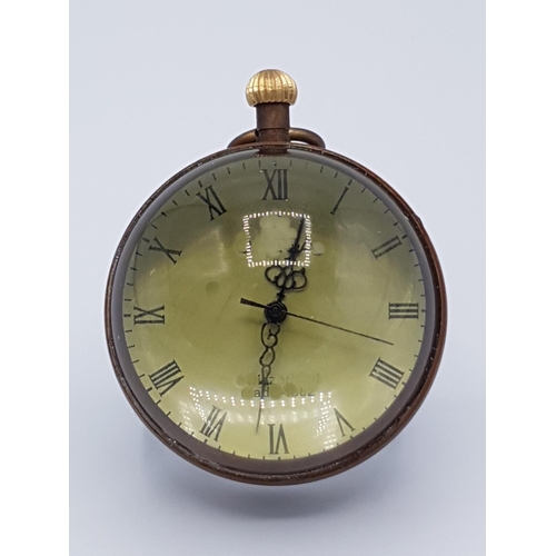 133 - GLASS MECHANICAL GLOBE CLOCK