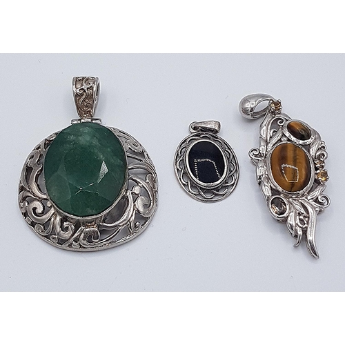 142 - PRESENTED AS THREE SILVER SCOTTISH/CELTIC PENDANTS