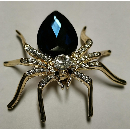 659 - YELLOW METAL RHINESTONE BLUE 5cm SPIDER BROOCH