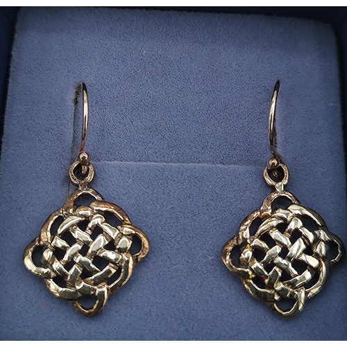 970 - PRESENTED AS A PAIR OF STERLING SILVER (Stamped 925) CELTIC DESIGN EARRINGS (Weight 2.5 Grams)