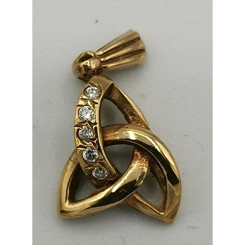 973 - PRESENTED AS A 9ct GOLD (Stamped 375) /CUBIC ZIRCONIA STONE SET KNOT DESIGN PENDANT (Weight 1.2 Gram... 