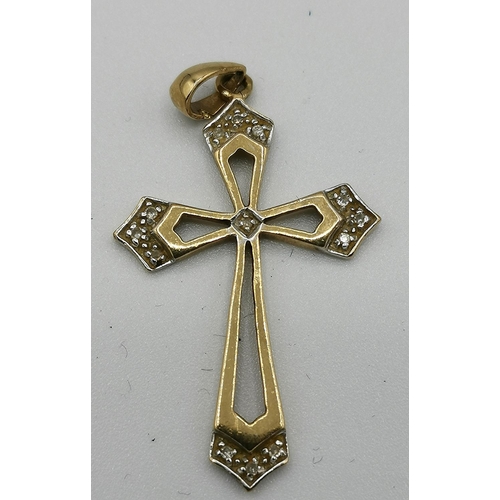 975 - PRESENTED AS A 9ct GOLD (Stamped 375) /DIAMOND STONE SET CROSS PENDANT (Weight 1.5 Grams)