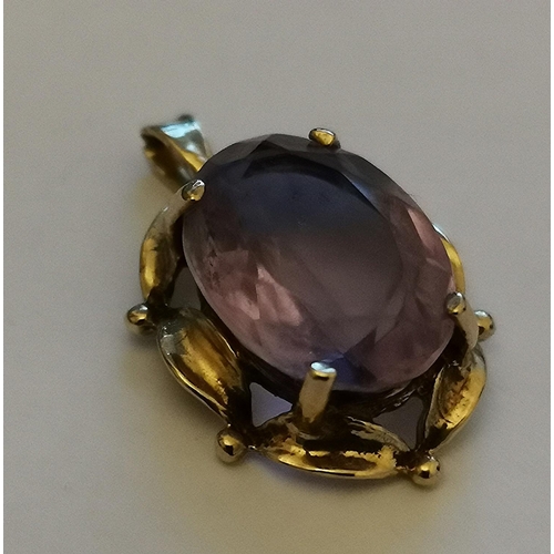 1223 - PRESENTED AS A 9ct GOLD  AMETHYST PENDANT 1978 (Weight 2.5 Grams)