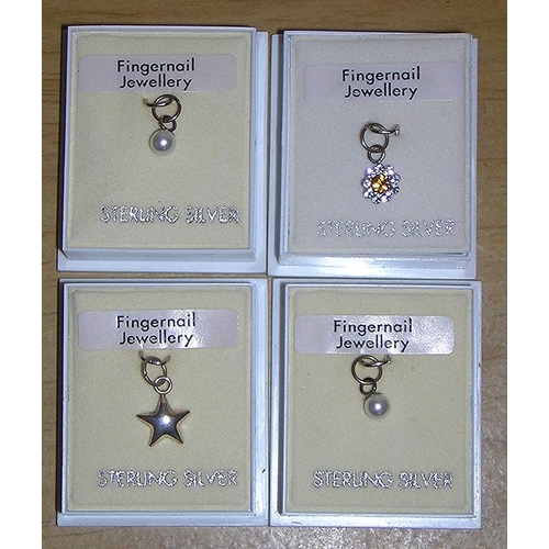 293 - PRESENTED AS FOUR STERLING SILVER FINGER NAIL JEWELLERY (Boxed)