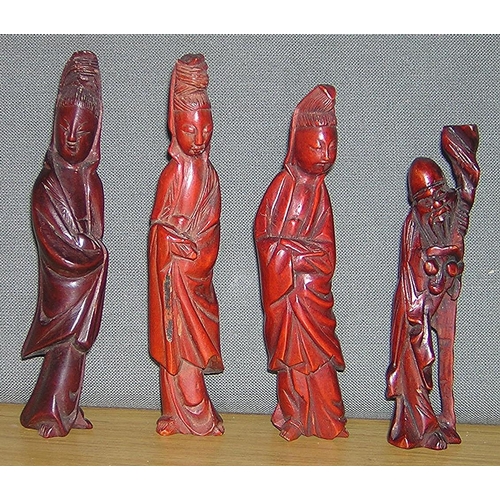 40 - WOODEN CARVED ORIENTAL FIGURINES (4)