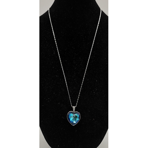 738 - PRESENTED AS A SILVER (Stamped 925) BLUE STONE SET PENDANT ON A   46 cm SILVER (925) NECK CHAIN  (To... 