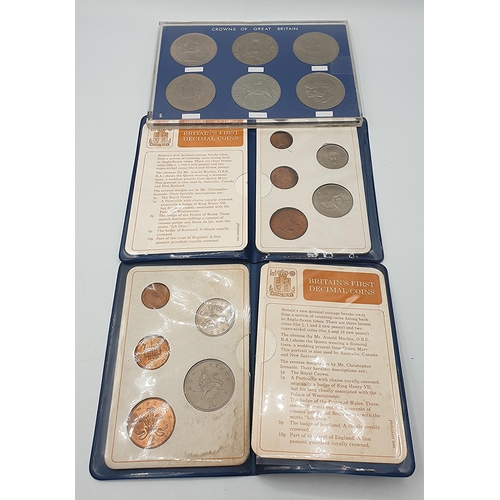 1053 - CASED CROWNS TOGETHER WITH TWO WALLETS OF BRITAINS FIRST DECIMAL COINS