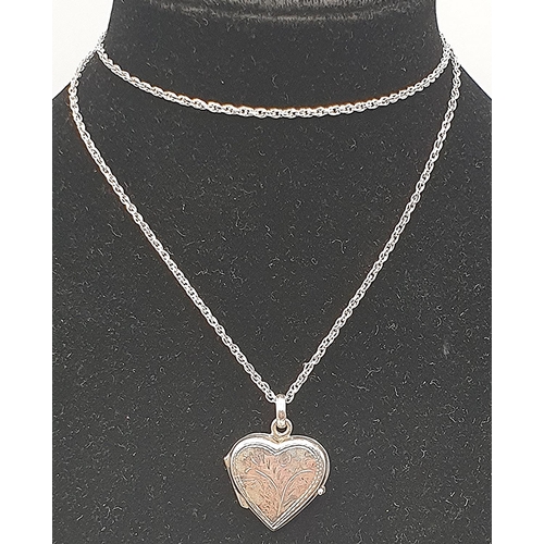 1062 - PRESENTED AS A SILVER (925) HEART PENDANT ON A 48cm NECK CHAIN (Total Weight 5.43 Grams)