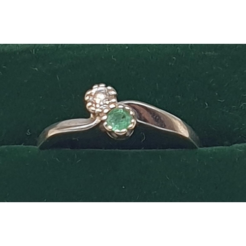 1092 - PRESENTED AS A 9ct WHITE GOLD (Hallmarked London 375) DIAMOND & EMERALD RING (All Diamonds Test +ve,... 