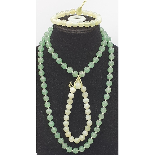 60A - PRESENTED AS A JADE NECKLACE,TWO BRACELETS Plus A PENDANT