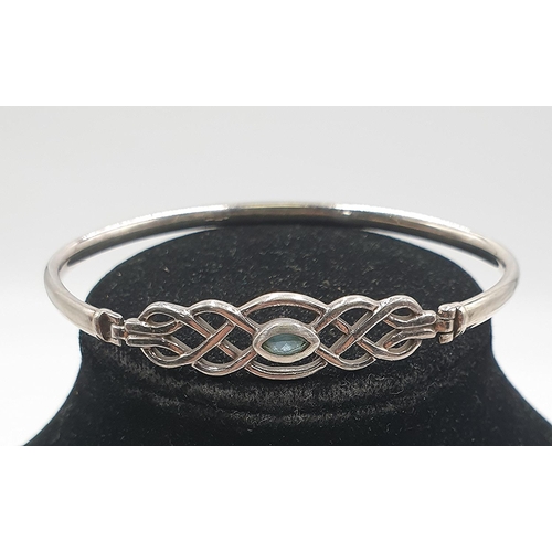 634 - PRESENTED AS A SILVER (Hallmarked) CELTIC DESIGN BANGLE (Total Weight 16.8 Grams)