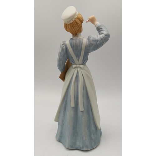 67 - ENESCO 16.5cm CHARACTER FIGURINE OF A NURSE