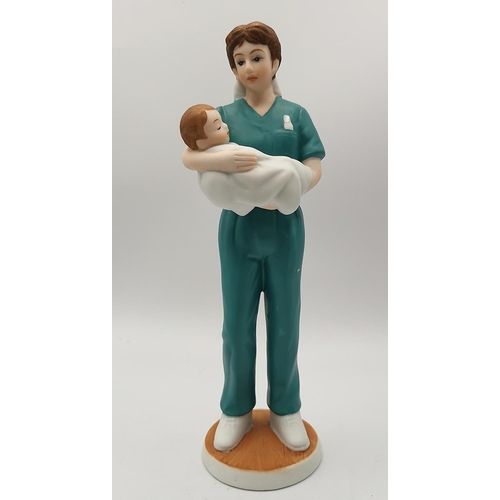 68 - LEFTON CHINA SRI LANKA 20cm CHARACTER FIGURINE OF A NURSE WITH A BABY