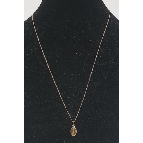 733 - PRESENTED AS A 9ct GOLD COFFEE BEAN PENDANT ON A 9ct GOLD 40cm NECK CHAIN (Total Weight 0.66 Grams)