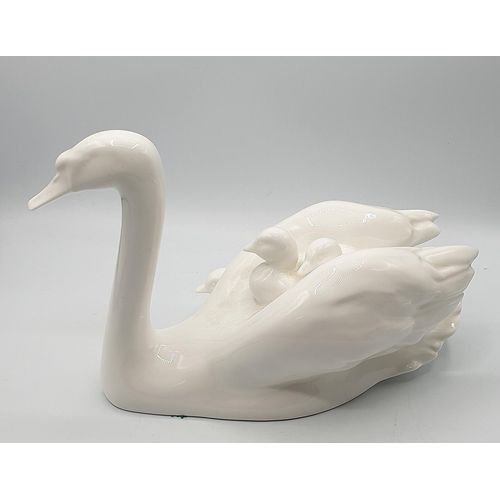 818 - ROYAL DOULTON 15.2cm MODEL OF A SWAN With TWO CYGNETS 