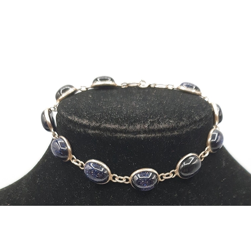 836 - PRESENTED AS A SILVER (925) 18cm STONE SET BRACELET