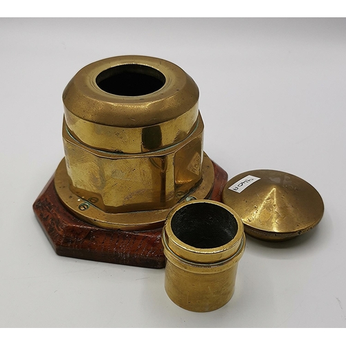 84 - BRASS INDUSTRIAL 11cm INKWELL ON A PLINTH