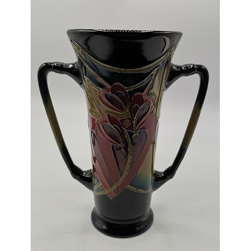 927 - MOORCROFT 16cm TWIN HANDLED VASE c2008