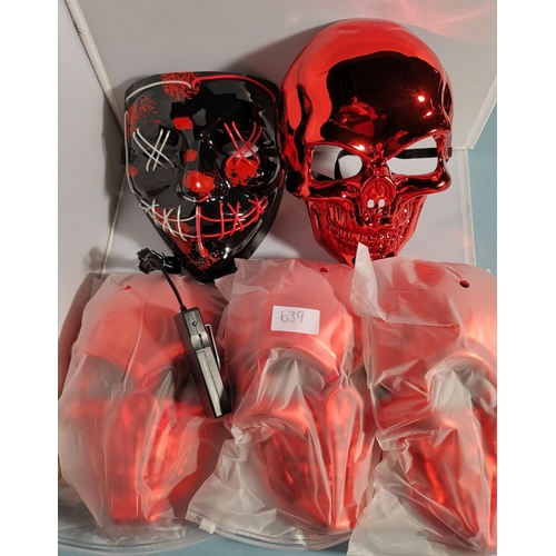 639 - RED HALLOWEEN SKULL MASKS (4) AND 1 LIGHT UP PURGE MASKS