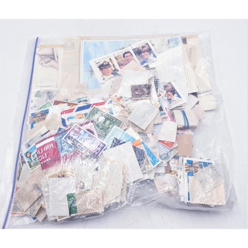 114 - BAG CONTAINING A Qty Of WORLD STAMPS