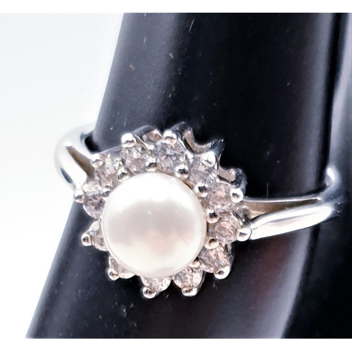 75 - PRESENTED AS A STERLING SILVER (925) /FAUX PEARL & CZ RING (Size M , Total Weight 2.90 Grams)