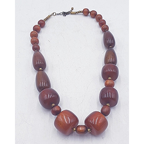 765 - AMBER ? STONE NECKLACE