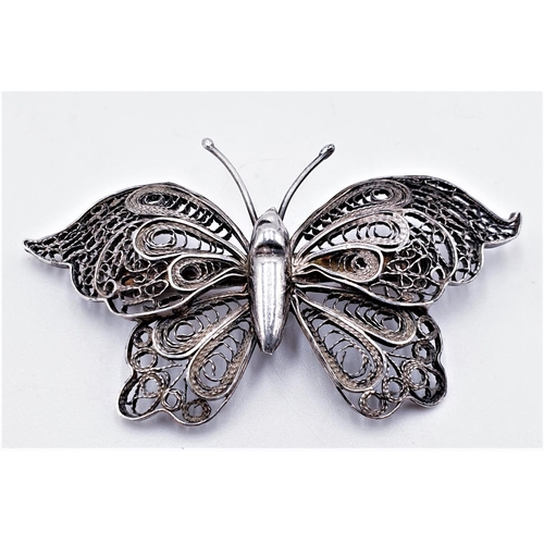 112 - PRESENTED AS A SILVER (Stamped 900) FILIGREE BUTTERFLY c1900