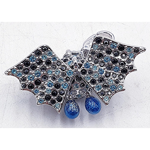 142 - PRESENTED AS A SWAROVSKI BAT CHARM (No Provenance )