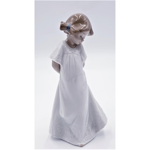 319 - LLADRO (Nao) Large 20cm CHARACTER FIGURINE OF A GIRL WITH ARMS BEHIND HER BACK 