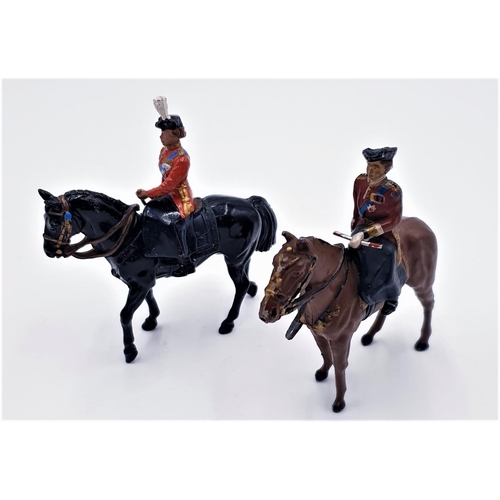 281 - BRITAINS LEAD MODELS (2) OF HRM QUEEN ELIZABETH II ON HORSEBACK