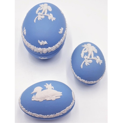 127 - WEDGWOOD BLUE JASPER WARE EGG SHAPED TRINKETS (3)