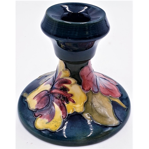 26 - MOORCROFT 9 cm CANDLESTICK IN THE HIBISCUS DESIGN