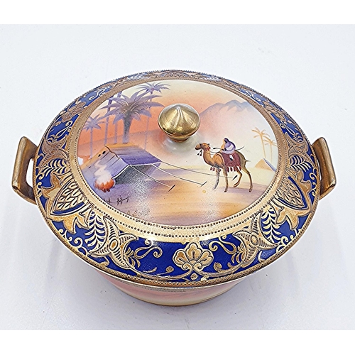 275 - CAMEL CHINA 11.5cm Dia  (Early 20th Century) TWIN HANDLED LIDDEDBOWL GOLD GILDING DETAILING WITH PAI... 