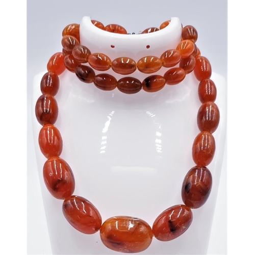 497 - FAUX AMBER GRADUATED BEAD NECKLACE