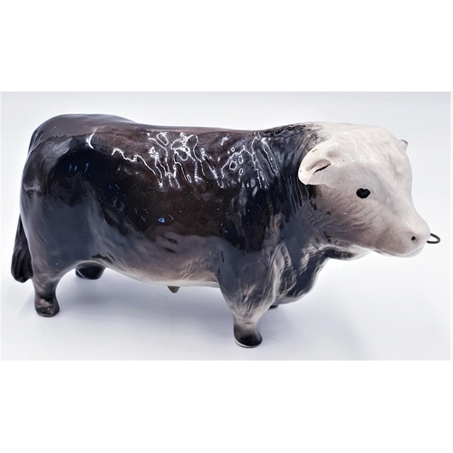 653 - CERAMIC 21cm MODEL OF A BUTCHERS SHOP BULL