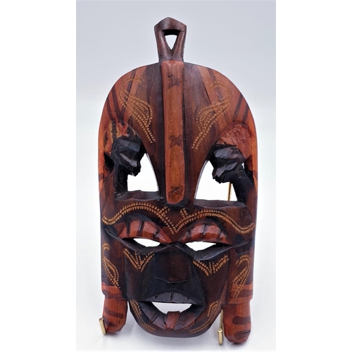 688 - CARVED WOODEN TRIBAL MASK