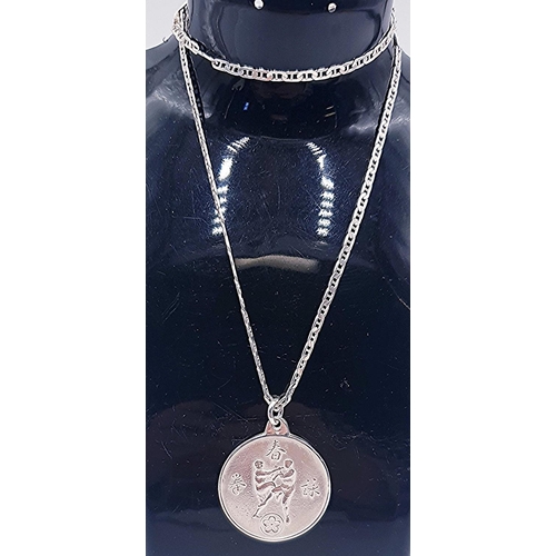 665 - SOLID SILVER MARTIAL ARTS MEDAL/PENDANT ON A SILVER (Hallmarked) 51 cm NECK CHAIN (Total Weight 22.1... 