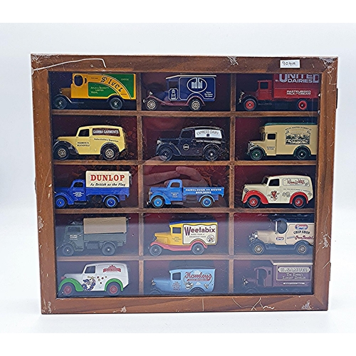 48 - WOODEN 33.5cm x 29.5cm WALL HANGING DISPLAY CABINET CONTAINING 15 Assorted DIE CAST CARS/VANS.
(Plea... 