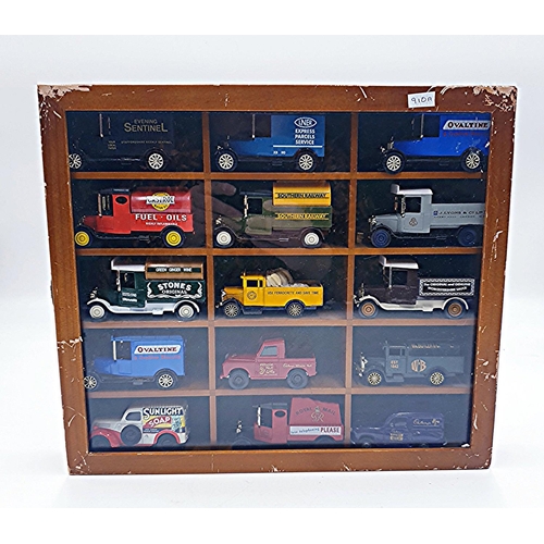 55 - WOODEN 33.5cm x 29.5cm WALL HANGING DISPLAY CABINET CONTAINING 15 Assorted DIE CAST CARS/VANS.
(Plea... 