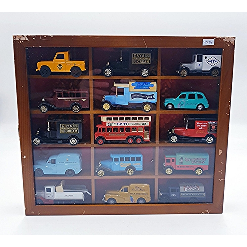 58 - WOODEN 33.5cm x 29.5cm WALL HANGING DISPLAY CABINET CONTAINING 15 Assorted DIE CAST CARS/VANS.
(Plea... 