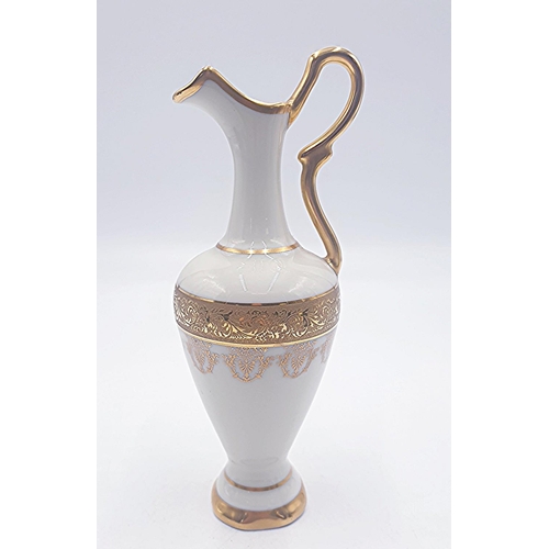 230 - LIMOGES (France) HARD PASTE PORCELAIN 24cm EWER With (Hand Gilded) DECORATION ON A CREAM GROUND.
(Li... 