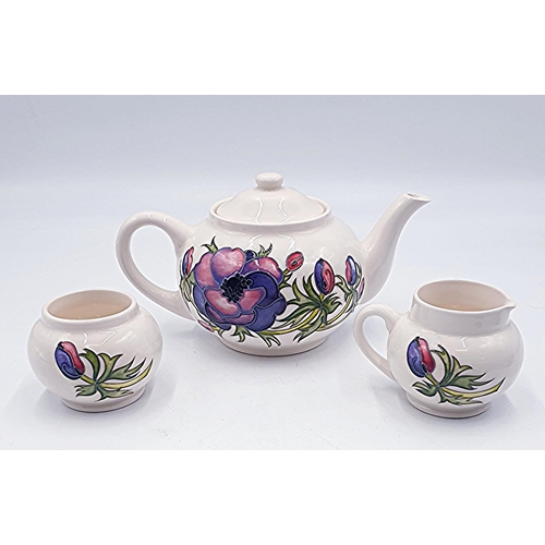 40 - MOORCROFT TEAPOT,SUGAR And CREAMER