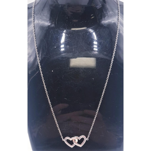 672 - SILVER (925) DOUBLE HEART PENDANT ON A SILVER (925) 40 cm NECK CHAIN (Total Weight 2.06Grams)