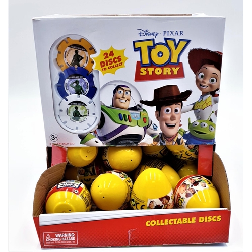 601 - BOX CONTAINING A Qty Of TOY STORY COLLECTABLE DISCS Plus SHOP DISPLAY