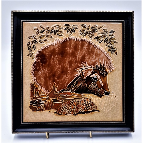 99 - MAWS & Co 25cm x 25cm TILE PICTURE DEPICTING AN HEDGEHOG
(Maw & Co have made earthenware encaustic t... 