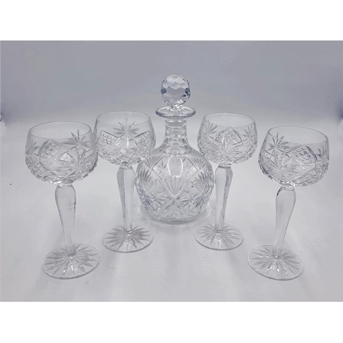 132 - CRYSTAL DECANTER & FOUR GLASSES