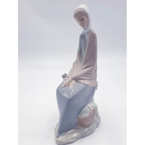 677 - LLADRO (Nao) Large 23.5cm CHARACTER FIGURINE OF A YOUNG LADY SAT DOWN With BASKET OF FRUIT